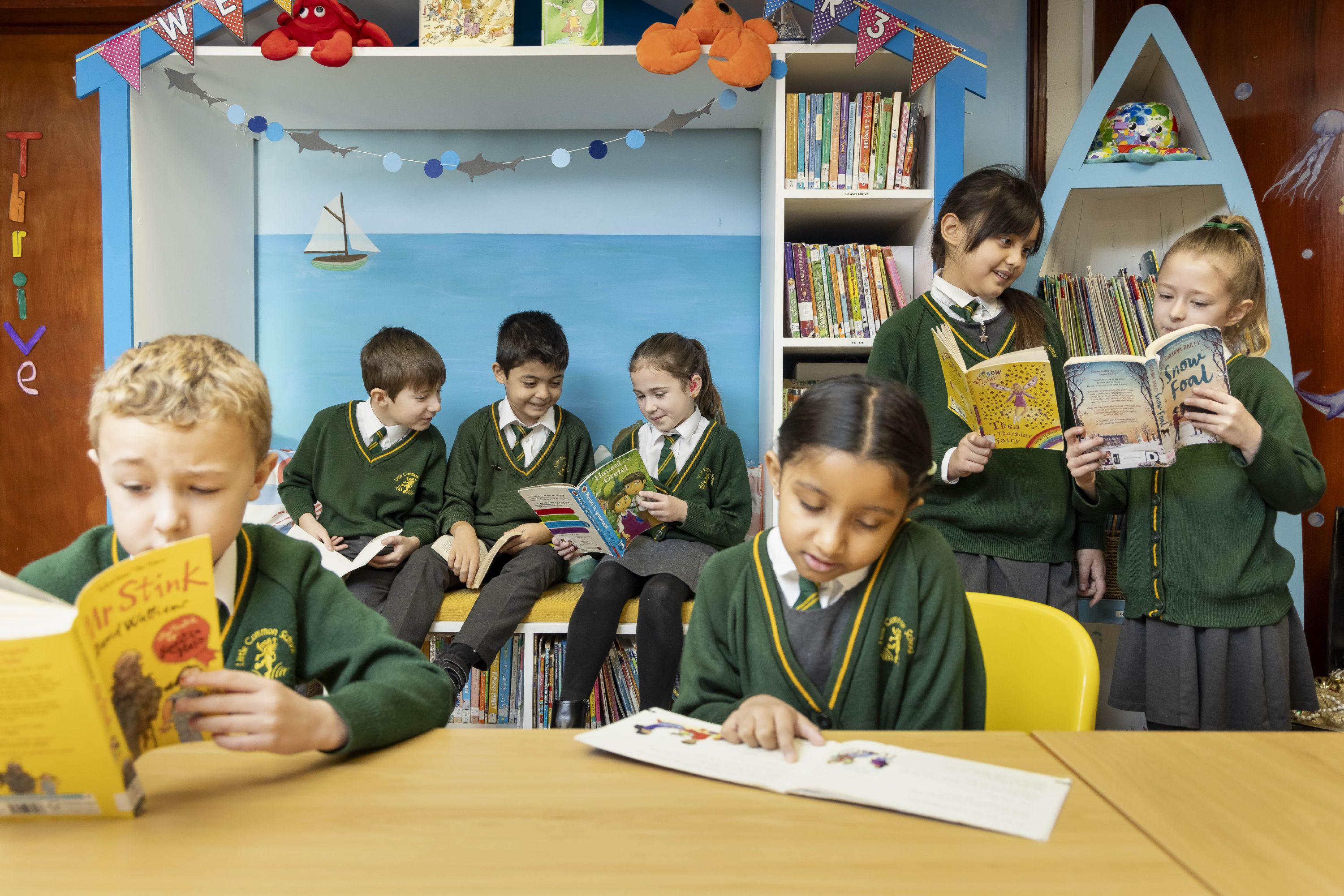 Children reading in the library