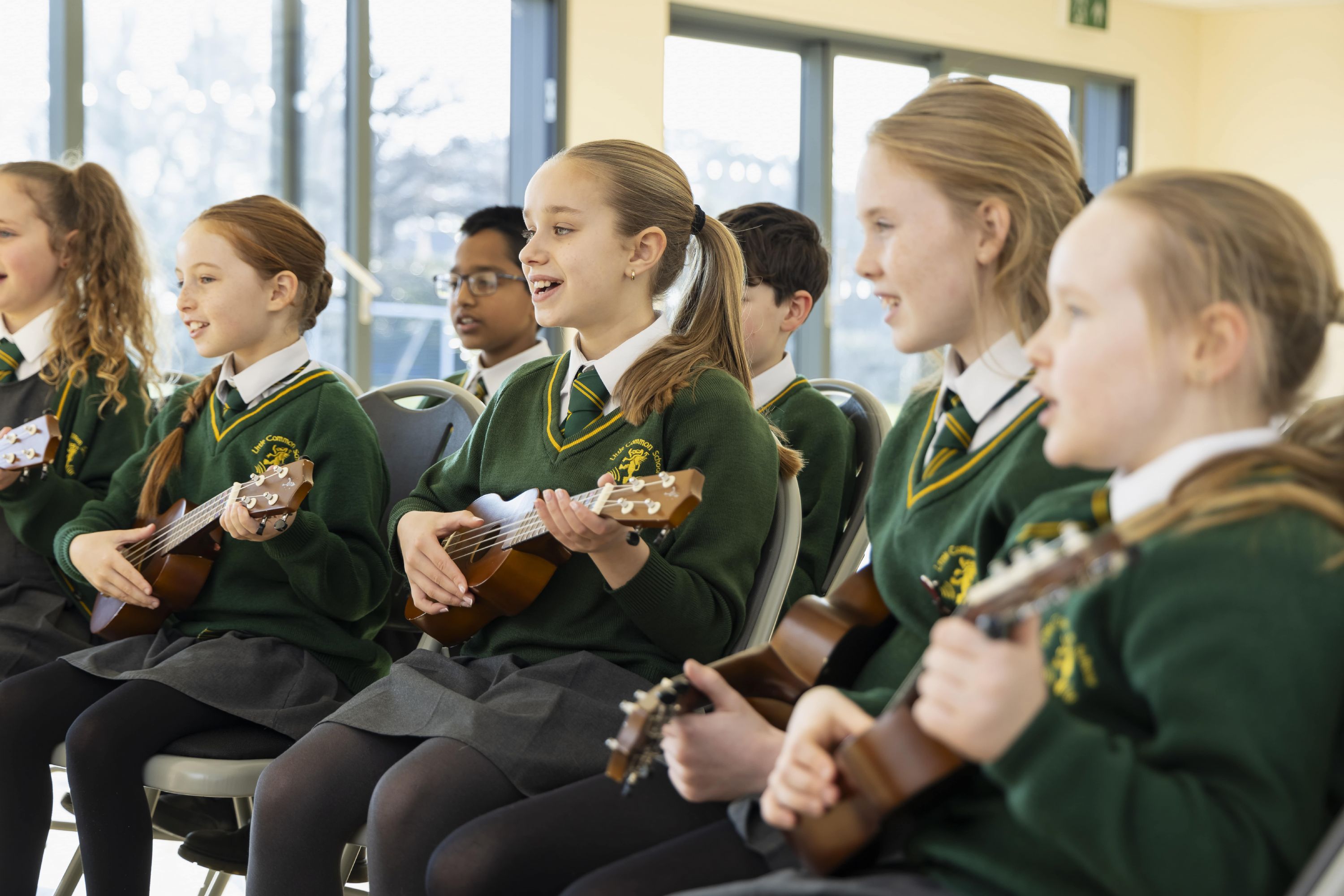 Children playing guitar